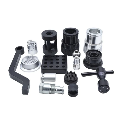 A collection of machined components with different shapes and surface finishes