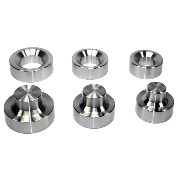 Turned metal components with circular shoulders and stepped features